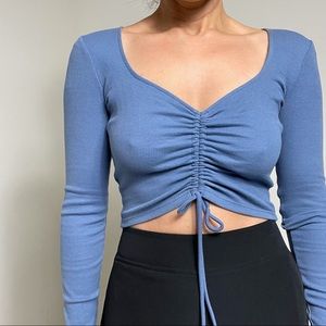 Zara cropped top with the adjustable front zone. Size M, runs small.